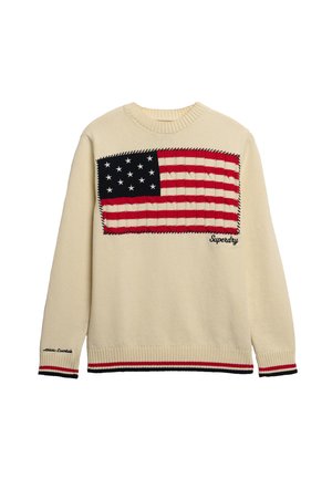 Crème trui met een gewoven ontwerp van de Amerikaanse vlag. Rood, wit en blauw met zwarte stikselaccenten en gestreepte zoomdetails.