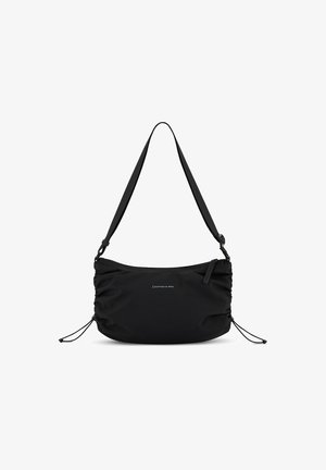 Black nylon shoulder bag with adjustable strap, gathered sides, zipper closure, and logo detail. Smooth texture and minimal design.