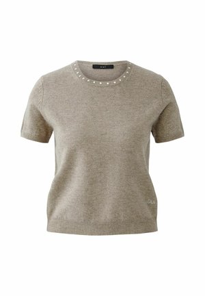 Beige Kurzarm-Strickpullover mit Rundhalsausschnitt. Verziert mit dekorativen Edelsteinen um den Ausschnitt und einem gerippten Saum. Weicher Stoff, schlichtes Design.