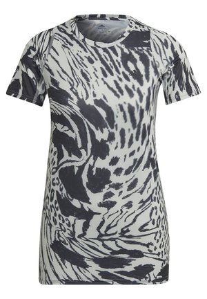 Short-sleeve athletic shirt with black and white abstract animal print and a small Adidas logo on the chest.
