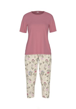 Różowy t-shirt z krótkim rękawem w połączeniu z beżowymi spodniami ozdobionymi pastelowym kwiatowym wzorem. Miękka tkanina i luźny krój na całej długości.