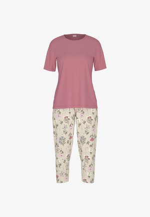 Różowy t-shirt z krótkim rękawem w połączeniu z beżowymi spodniami ozdobionymi pastelowym kwiatowym wzorem. Miękka tkanina i luźny krój na całej długości.