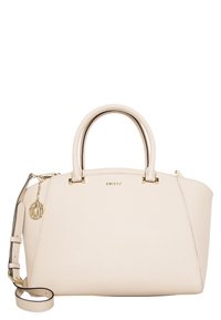 DKNY handbag in cream leather, with dual top handles and a detachable shoulder strap. Features gold-tone hardware and a logo charm.