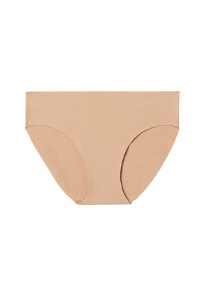 Bañador beis de algodón con una textura suave, diseño de cobertura total y aberturas de pierna curvadas. Bordes sin costuras y estilo minimalista.