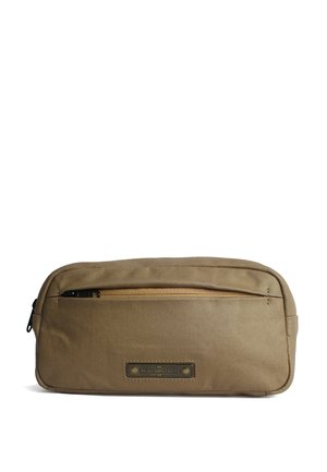 Rechteckige beige Kulturbeuteltasche aus Stoff. Verfügt über einen Reißverschluss, eine Fronttasche und eine Metallmarke. Strukturierte Oberfläche mit minimalen Details.