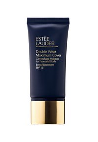 Marineblå tube med gullring, merket "Double Wear Maximum Cover." Inneholder kamuflasjemakeup for ansikt og kropp, SPF 15.