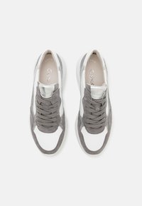 Gray and white sneaker featuring a suede and mesh upper, round toe, thick laces, padded collar, and rubber outsole.