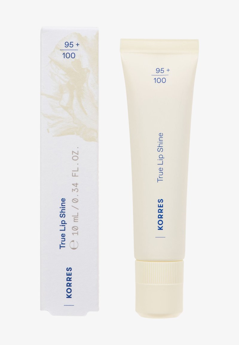 Tubka błyszczyku do ust Korres True Lip Shine oraz biała pudełko z niebieskim napisem, 10 ml, oznaczone "95+ / 100" w celu oceny jakości.
