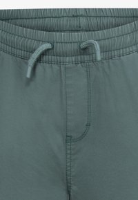 Converse LIFESTYLE PANT - Kapsáče - admiral elm