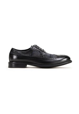 Black leather dress shoe featuring a textured gray fabric upper, brogue detailing, and a sleek low heel. Designed with lace-up closure.