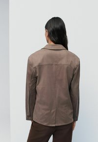 Next TALL FIT - Kerge jope - brown