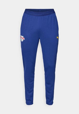 Pantalon de sport bleu en tissu léger, avec une taille élastique, des poches latérales et des logos en accents blancs et jaunes.