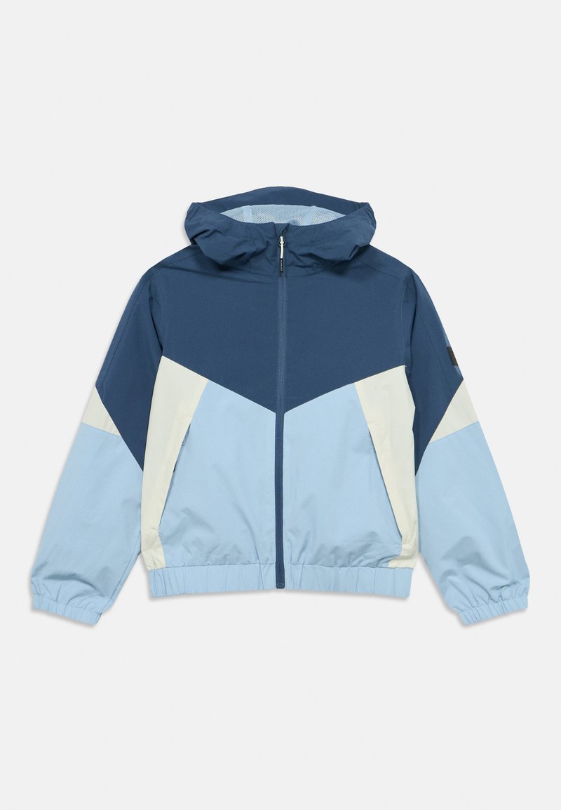 Αντιανεμικό μπουφάν με μπλοκ χρωμάτων σε αποχρώσεις μπλε και ανοιχτού μπλε. Διαθέτει κουκούλα, μπροστινό φερμουάρ και ελαστικές μανσέτες και τελείωμα.