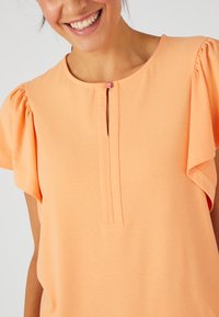 Damart Camiseta estampada - abricot