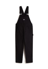 Schwarze Baumwoll-Latzhosen mit verstellbaren Trägern, einer Fronttasche, Seitentaschen und Metallbeschlägen. Glatte Textur mit lockerer Passform.