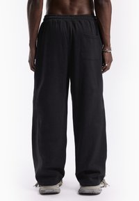 FAVELA DART JOGGER UNISEX - Tracksuit bottoms - black