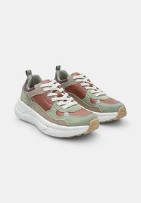 Green and brown suede sneakers with white laces, textured surfaces, thick white soles, and accent details in darker shades.