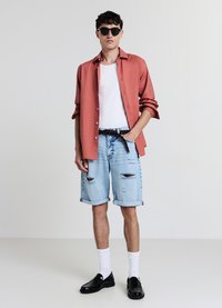 Calliope CHIARO ROTTURE - Shorts di jeans - blu denim chiaro