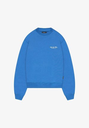 Sinine ümmarguse kaelusega sweatshirt, mis on valmistatud pehmest kangast. Omab soonikkoes mansette ja alumist äärt ning ees on väike valge logo.