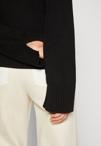 Calvin Klein Jeans Stickad tröja - black