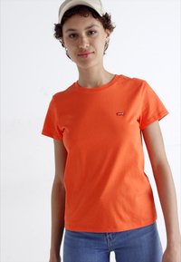 Levi's® Tričko s potlačou - orange