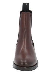 Botín Chelsea de cuero marrón con un acabado liso, paneles laterales elásticos y una lengüeta en la parte trasera. Suela de goma para mayor tracción.
