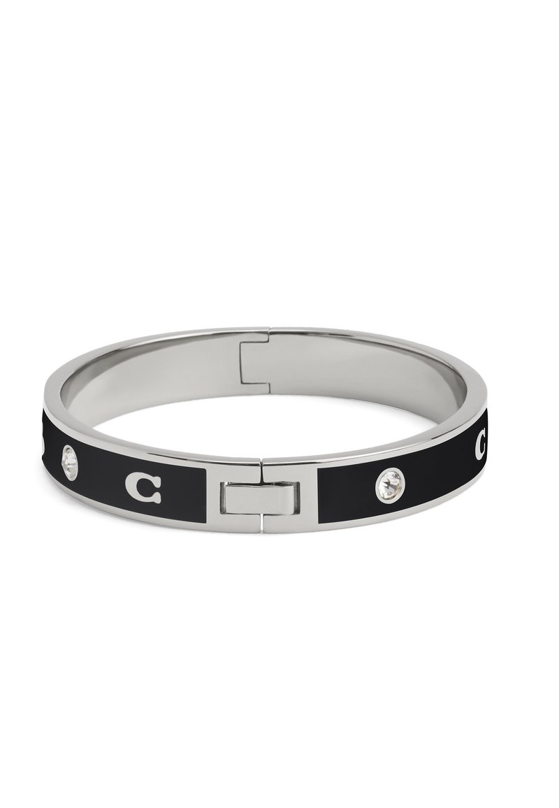 Zilveren armband met zwarte emaille inleg, kristalaccenten en zilveren 'C' logo's, met een scharniersluiting.