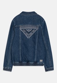 Džínová bunda v tmavě modré barvě s vyšitým trojúhelníkovým vzorem na zadní straně, elastickým pasem a klasickým límcem. Obsahuje kontrastní švy.