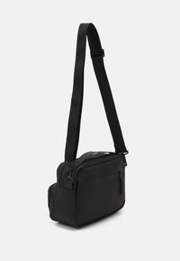 Rains CARGO BOX BAG UNISEX - Borsa a mano - black