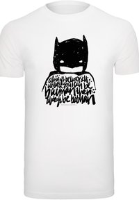 White cotton t-shirt featuring a black graphic of a masked figure and text, "always be yourself unless you can be Batman."