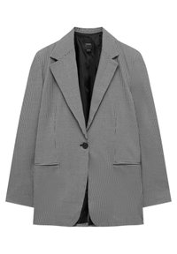 Blazer pied-de-poule noir et blanc avec revers crantés, fermeture par un unique bouton noir et deux poches passepoilées sur le devant, entièrement doublé à l'intérieur.