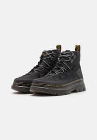 Dr. Martens Šněrovací kotníkové boty - black