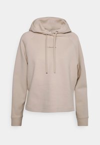 Felpa beige con cappuccio regolabile, polsini e orlo a costine. Presenta un logo discreto al centro. Realizzata in morbido tessuto misto cotone.