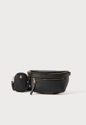 Black leather bag with two zippered compartments and gold-tone hardware; includes a small matching pouch with a logo embossed.