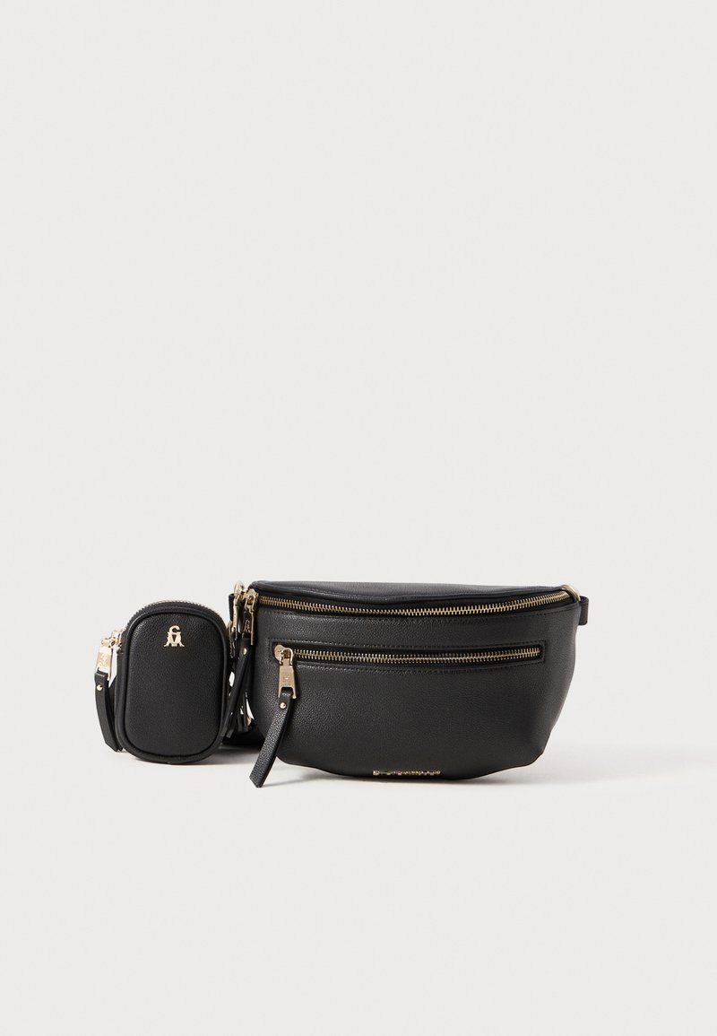 Black leather bag with two zippered compartments and gold-tone hardware; includes a small matching pouch with a logo embossed.