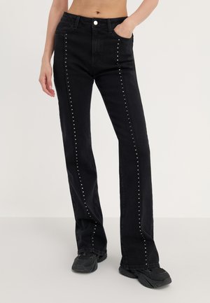 Flared Jeans - black denim