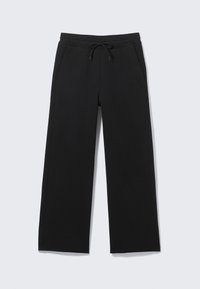 ASTRO LOOSE UNISEX - Treningo apatinė dalis - black