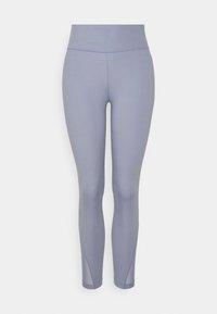 Leggings dalam nuansa lavender lembut dan ringan. Terbuat dari bahan elastis, memiliki pinggang tinggi dan tekstur halus, tanpa pola atau perangkat keras yang terlihat.