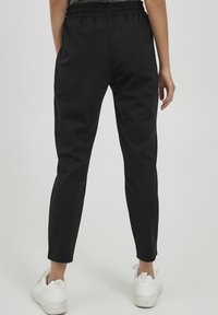 Oxmo OXHELLAS REGULAR FIT - Donji dijelovi trenirke - black