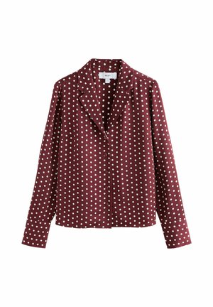 Bordeauxfarbene Bluse mit langen Ärmeln, weißen Polka-Dots, Kerbkragen und geknöpften Manschetten.