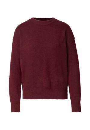 Vínový pletený svetr s kulatým výstřihem, volným střihem a dlouhými rukávy. Měkká textura s žebrovanými detaily na rukávech a lemech.