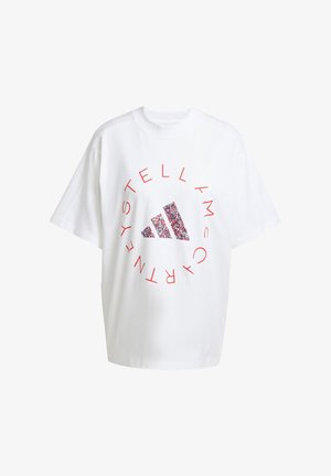 Přes veliká bílá bavlněná trička s červeným kruhovým textem a vícebarevným logem Adidas ve středu. Krátké rukávy a kulatý výstřih.