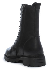 Bottine en cuir noir avec fermeture éclair latérale, lacets à l'avant, languette à l'arrière et semelle en caoutchouc robuste avec petit talon bloc.