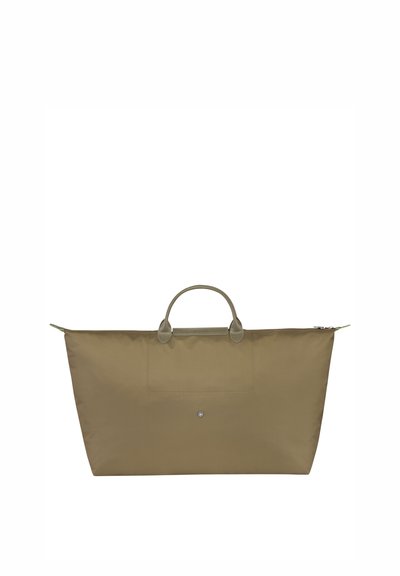 Large olive green tote bag made from durable fabric, featuring dual handles, a zip closure, and a front pocket with a snap detail.