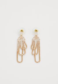 Zlatne viseće naušnice s više kaskadnih lanaca, ukrašene prozirnim rhinestonesom i transparentnom podlogom za sigurno nošenje.