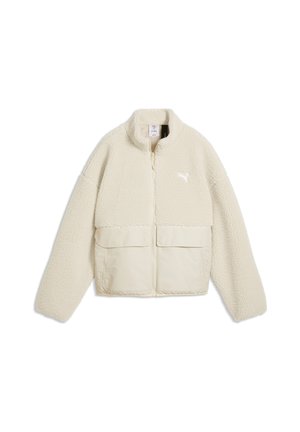 Cream-colored zip-up fleece jacket with textured upper half, smooth lower pockets, and a small animal logo on the chest.