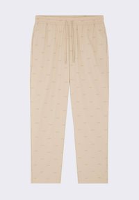 Pantalons de jogging beige avec taille à cordon, présentant un motif subtil « PXP » sur l'ensemble. Tissu doux, design à jambe droite.