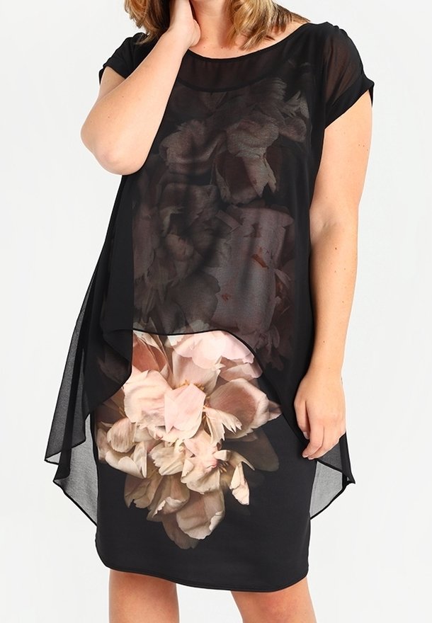 Černé vrstvené šaty s průhlednou vrchní vrstvou s květinovým vzorem a pevným černým spodním sukněm. Materiál je lehký a splývavý.