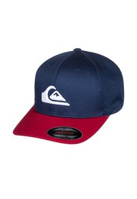 Navy blue cap with a red visor; features a white logo on the front, made of fabric; flexible fit design.