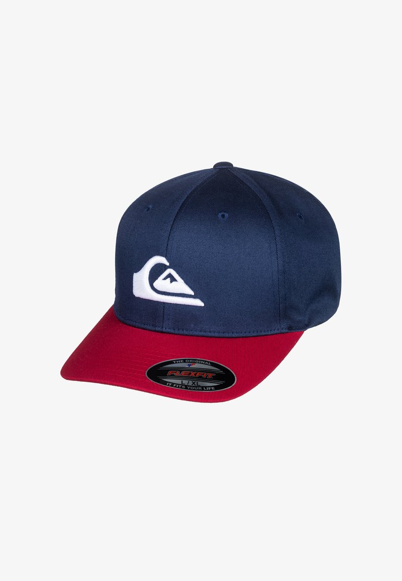 Navy blue cap with a red visor; features a white logo on the front, made of fabric; flexible fit design.